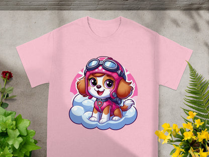 Pink t-shirt with cartoon dog character wearing aviator hat and goggles on a cloud.