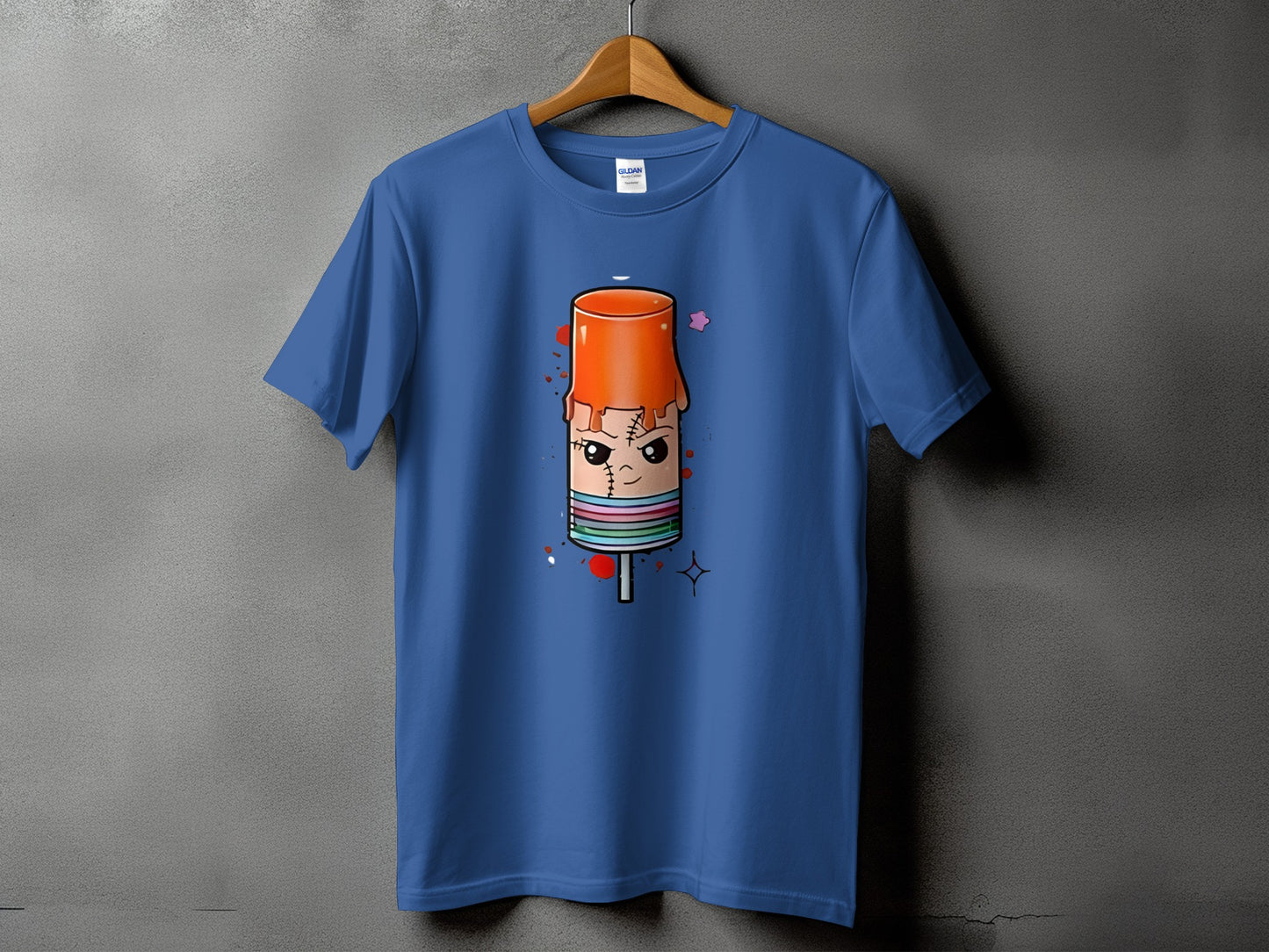 Blue t-shirt with a cartoon popsicle character with stitches and drips.
