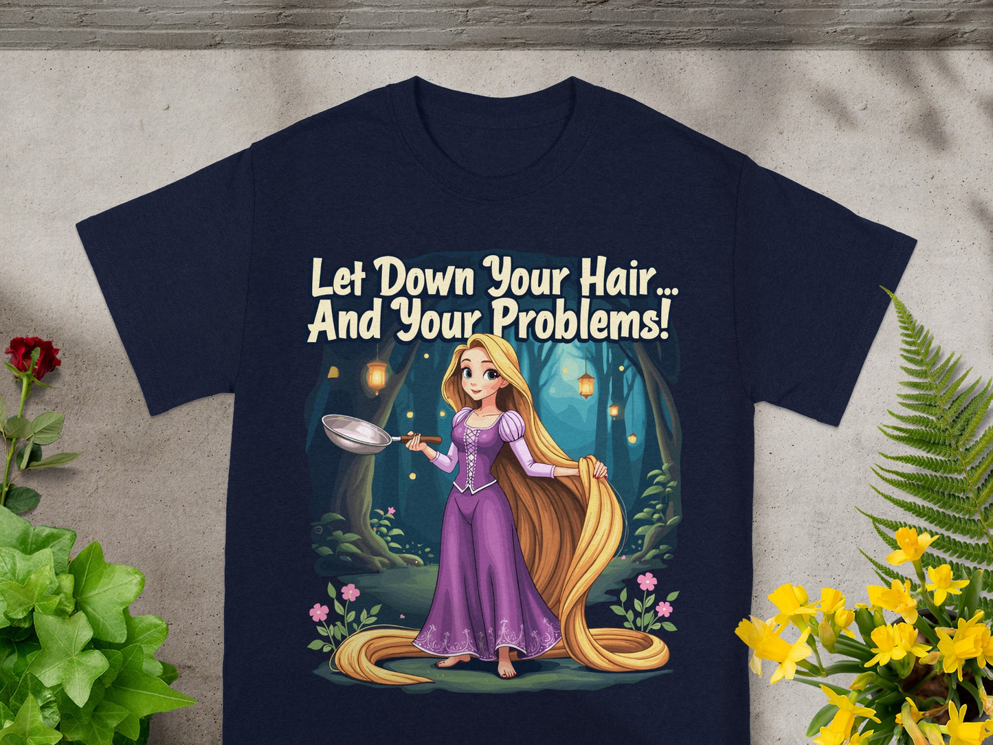 Navy t-shirt with Rapunzel holding a frying pan and long blonde hair.