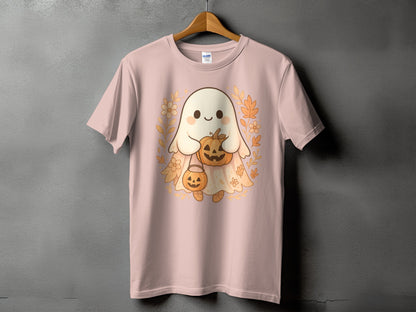 Pink t-shirt with a cute ghost holding pumpkins and surrounded by fall leaves.
