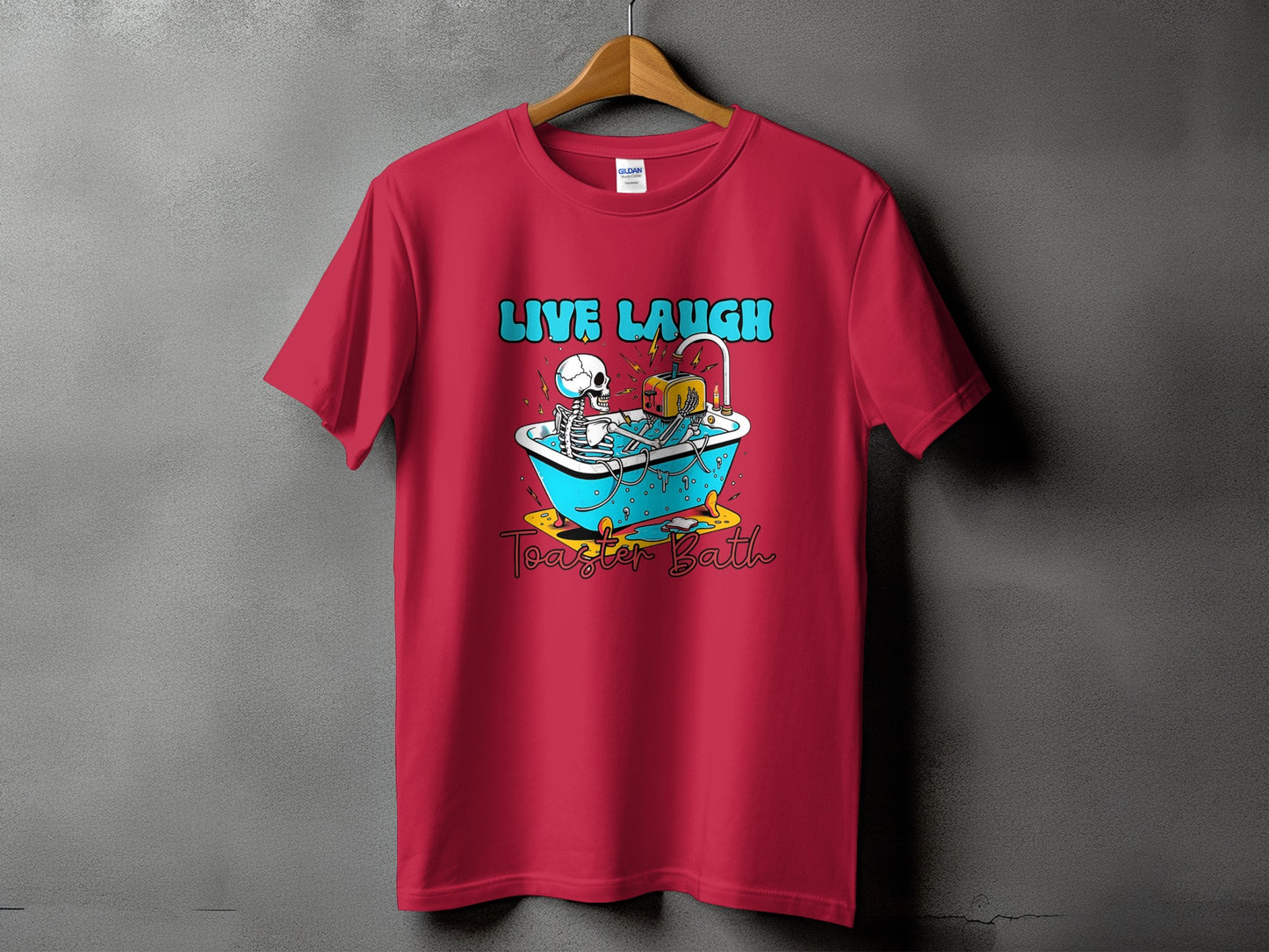Red t-shirt with skeleton in bathtub and toaster, reading "Live Laugh Toaster Bath".