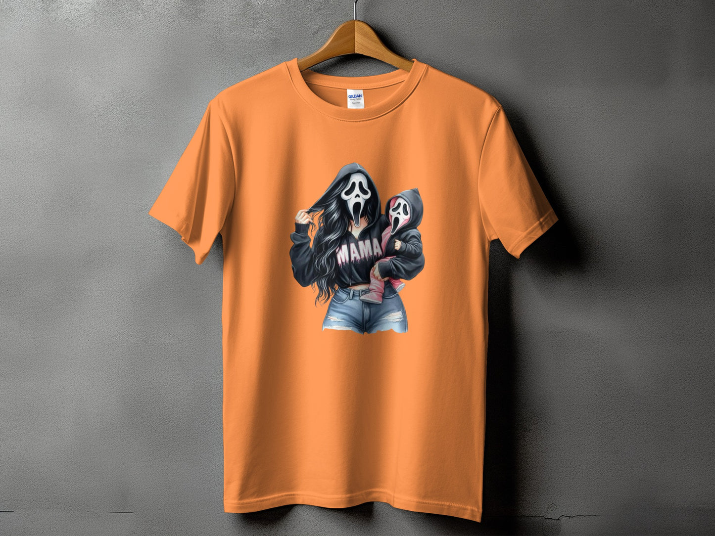 Orange t-shirt with graphic of two figures in Scream masks, one holding the other.