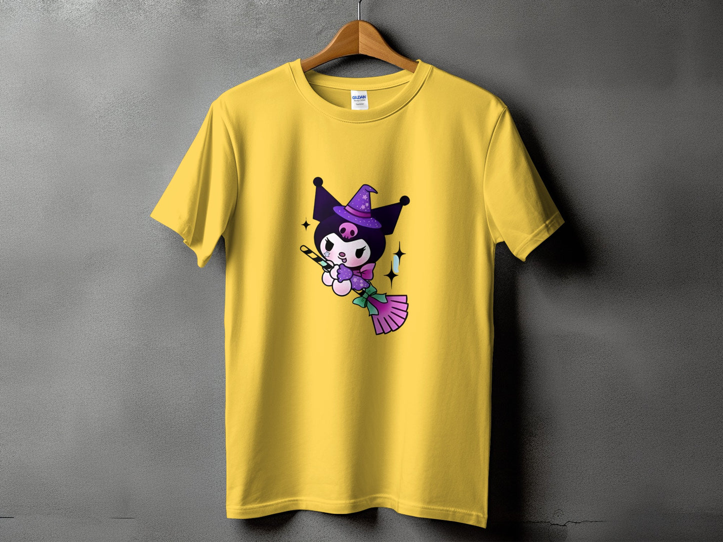 Yellow t-shirt with Kuromi character in witch hat flying on broomstick.