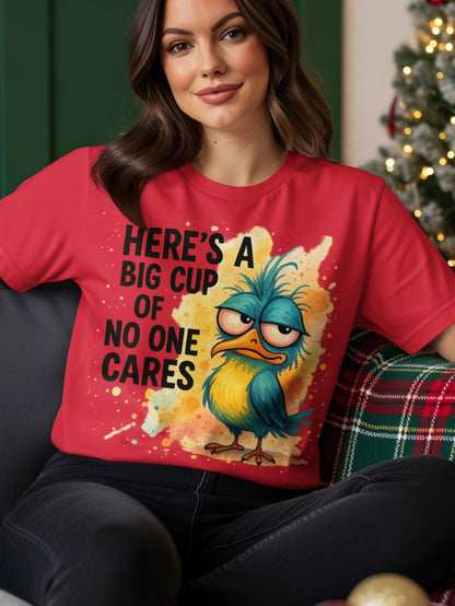 T-shirt with cartoon bird saying "Here's a big cup of no one cares".