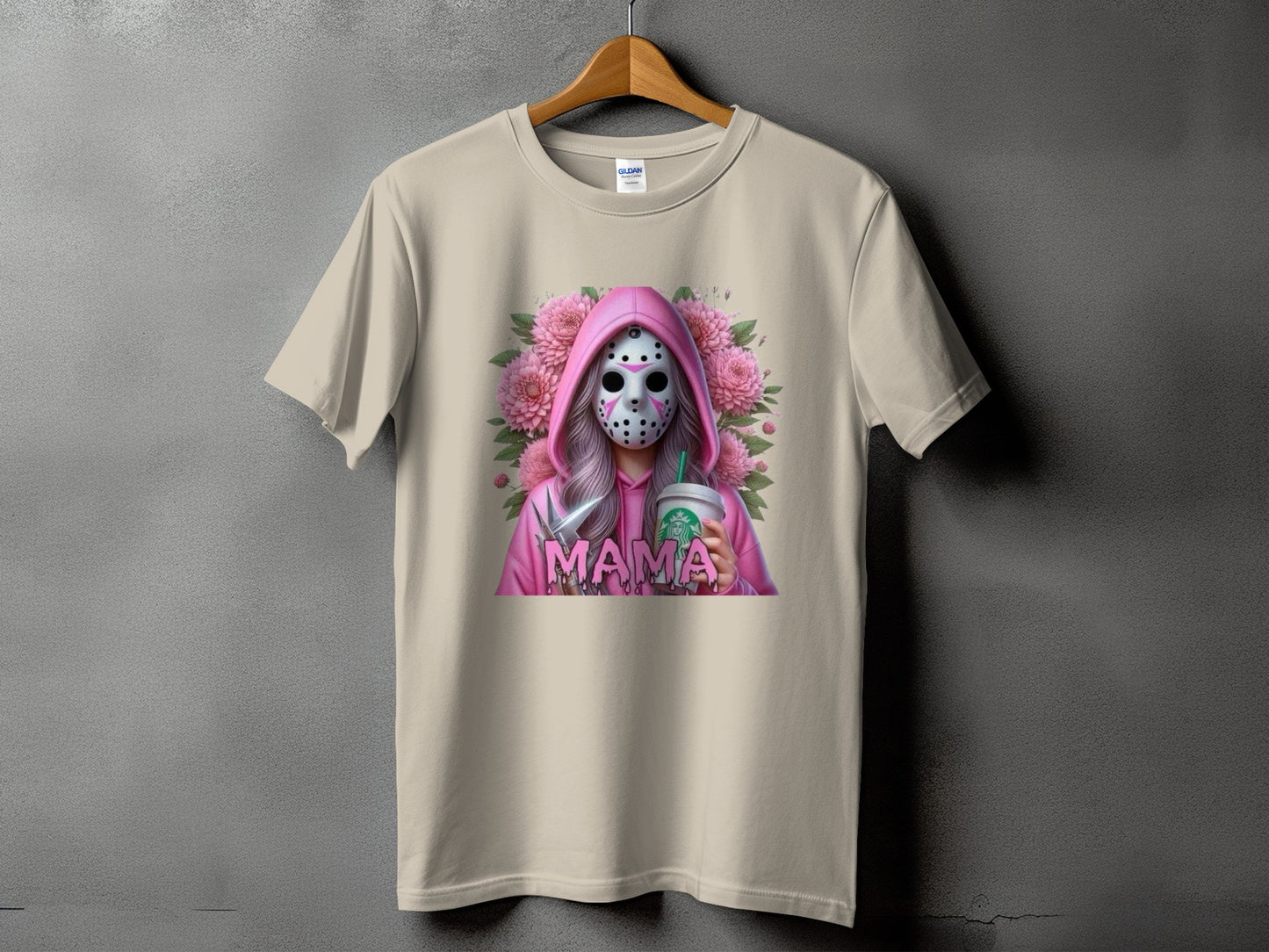 Light tan t-shirt with a pink hooded figure wearing a hockey mask, holding a Starbucks cup and knife.