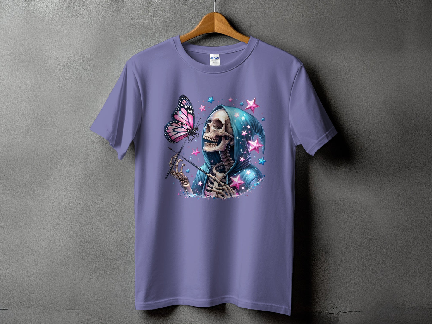Skeleton in hooded robe with butterfly and colorful stars graphic on a purple t-shirt.
