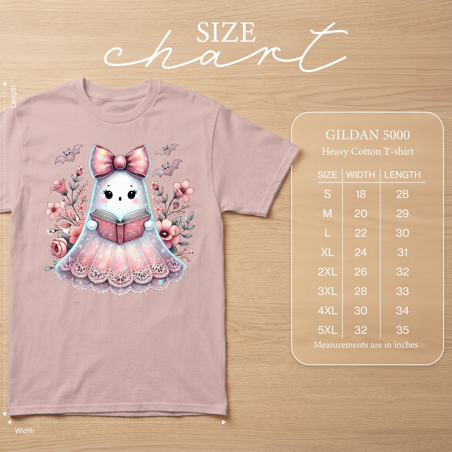 Pink t-shirt with a cute ghost reading a book with floral and bat graphics. Includes size chart.