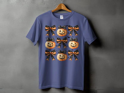 Purple t-shirt with a repeating pattern of jack-o'-lanterns and Halloween bows.