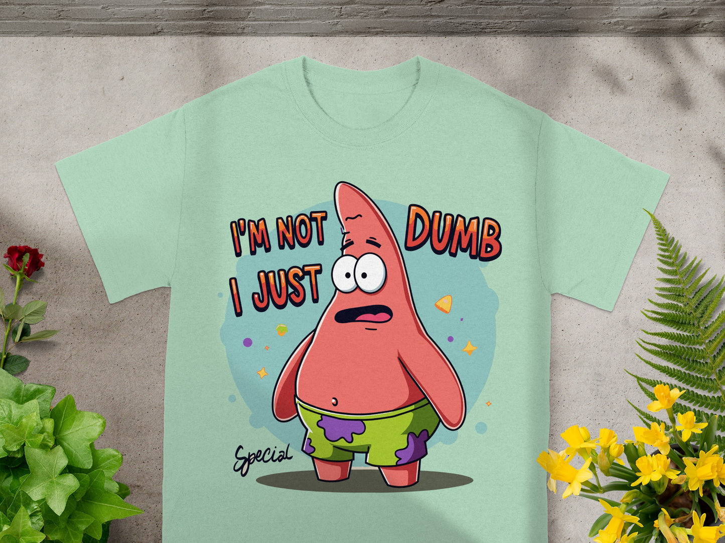 Mint t-shirt with Patrick Star saying "I'm not dumb I just..."