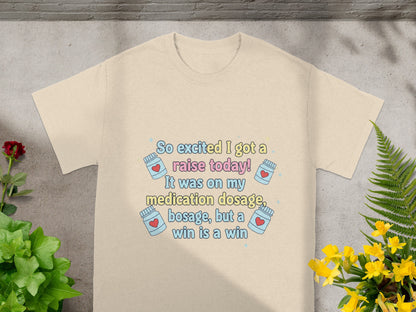 Cream t-shirt with colorful text about medication dosage and a raise.