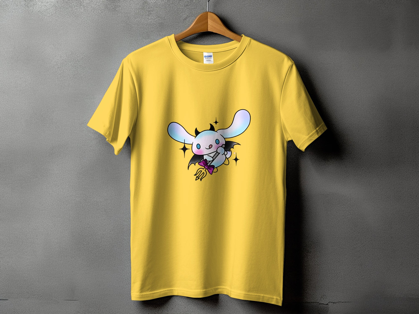 Yellow t-shirt with a cartoon devilish white rabbit graphic.