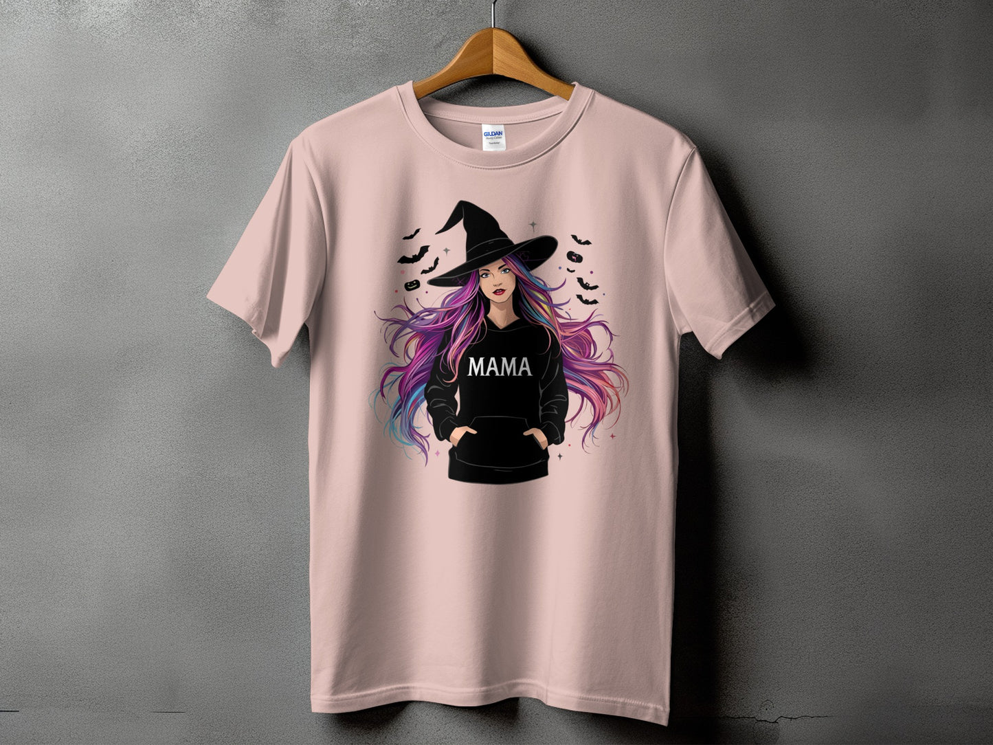 Pink t-shirt with witch graphic and "MAMA" text