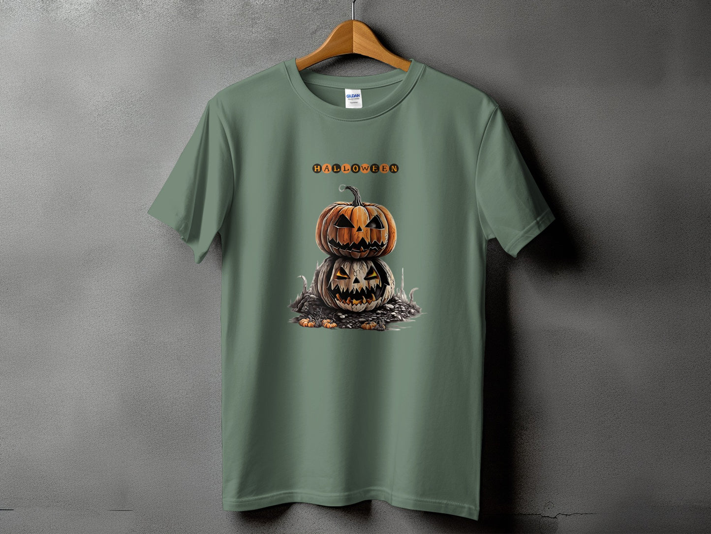 Green t-shirt with stacked Jack-o'-lanterns and the word "HALLOWEEN" above.
