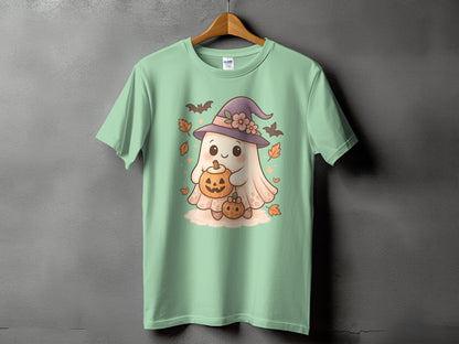 Light green t-shirt with a ghost holding pumpkins and wearing a witch hat.