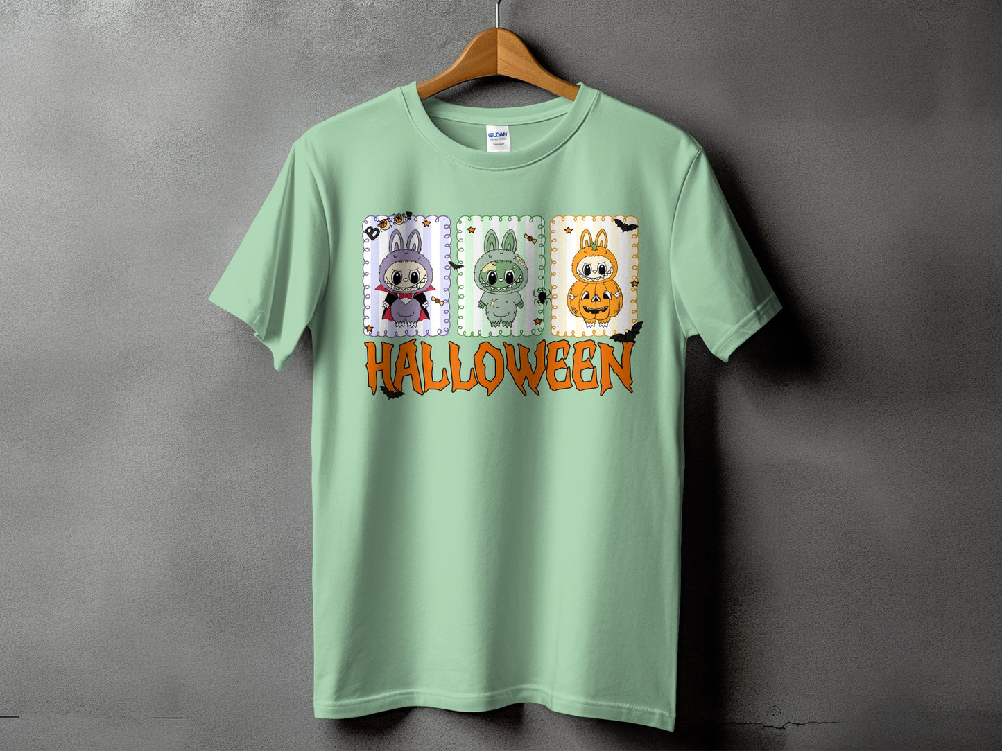 Mint t-shirt with three Halloween bunny characters and "HALLOWEEN" text.