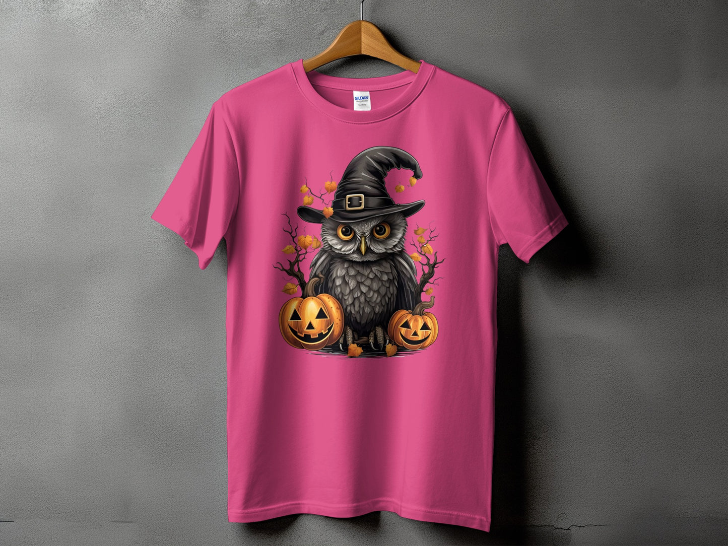 Pink t-shirt with a Halloween owl wearing a witch hat and jack-o'-lanterns.