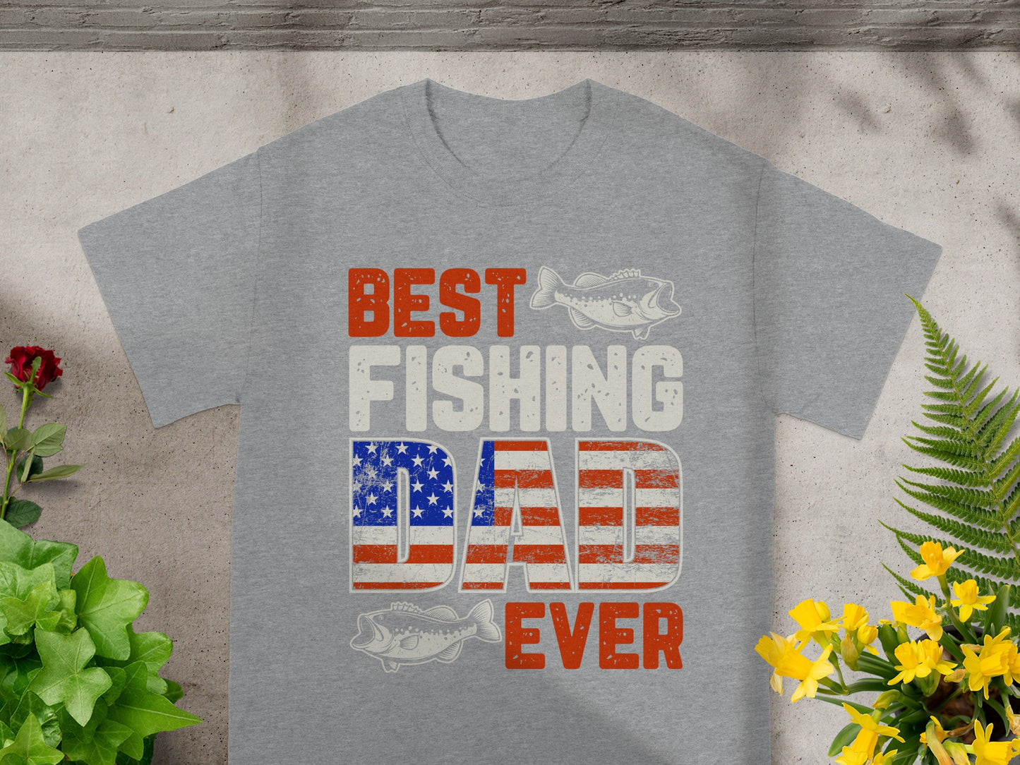 Grey t-shirt with "BEST FISHING DAD EVER" text and bass fish graphics.