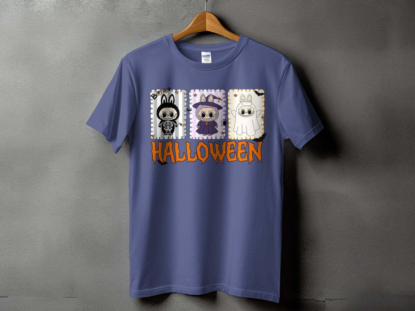 Purple t-shirt with three Halloween-themed cartoon characters and the word HALLOWEEN.