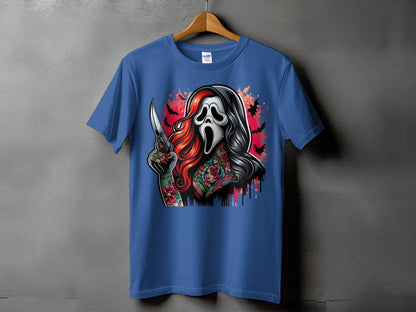 Blue t-shirt with graphic of a ghostly figure with red hair, tattoos, and a knife.