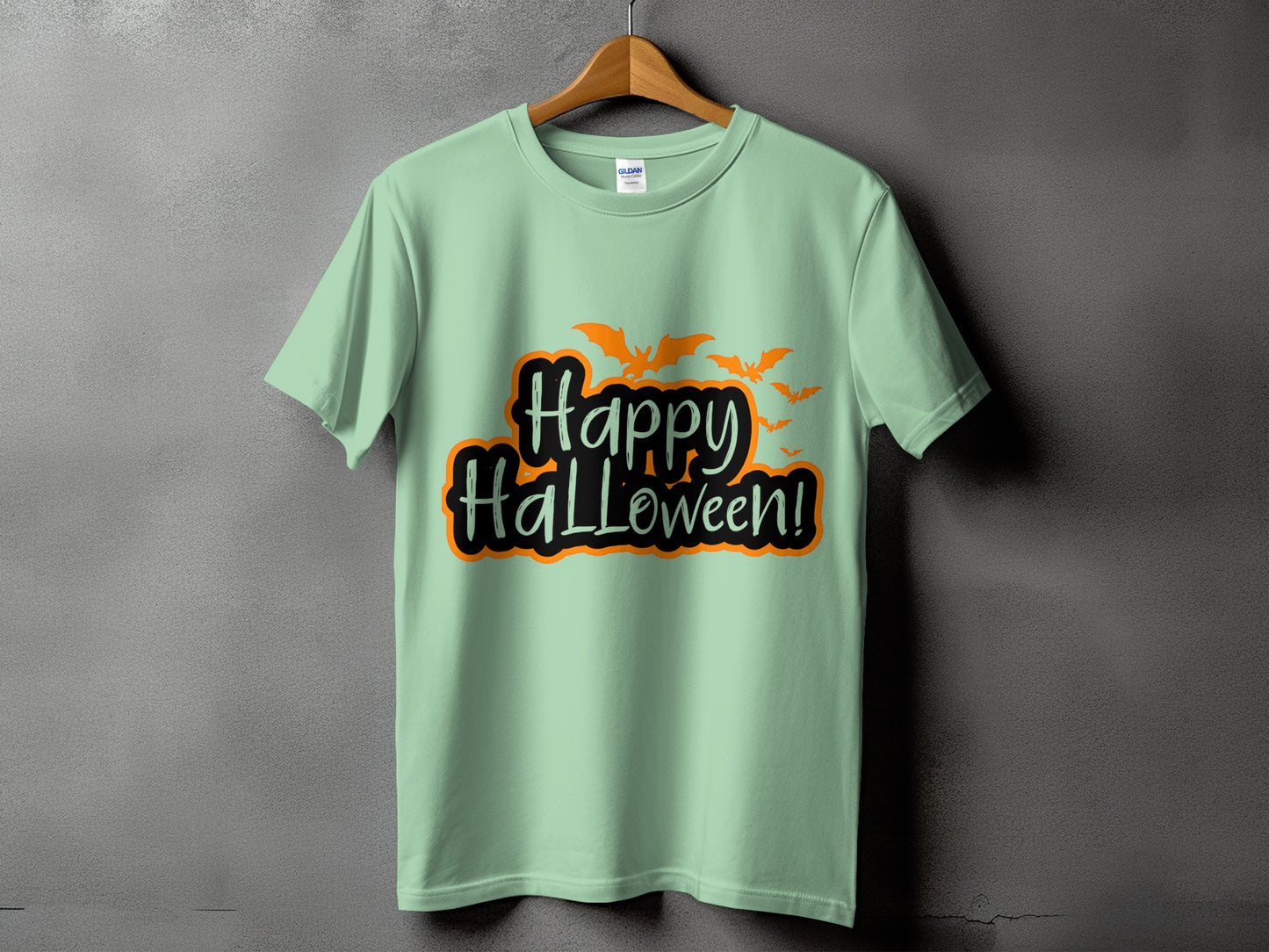 Mint green t-shirt with black and orange "Happy Halloween!" text and bats.