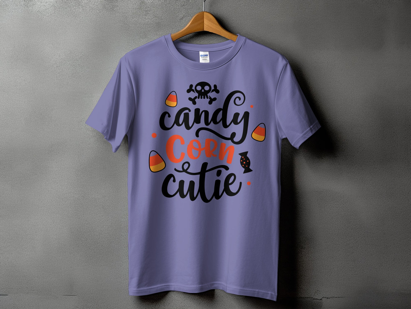 Purple t-shirt with "Candy Corn Cutie" text and Halloween graphics.