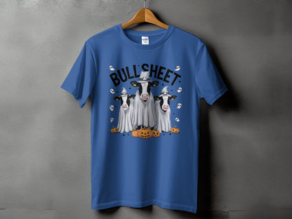 Blue t-shirt with "Bull'Sheet" text, three cows in ghost costumes, and pumpkins.
