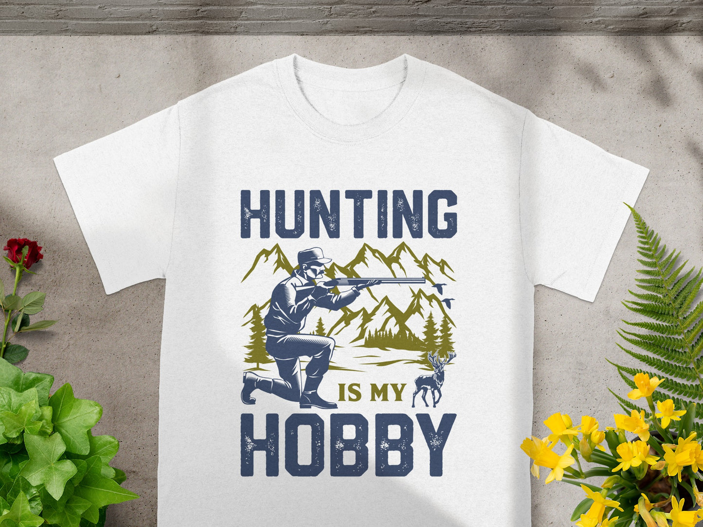 White t-shirt with "HUNTING IS MY HOBBY" text and hunting graphic.