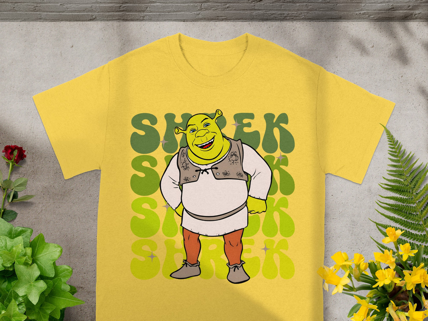 Yellow t-shirt with Shrek graphic and green retro text.