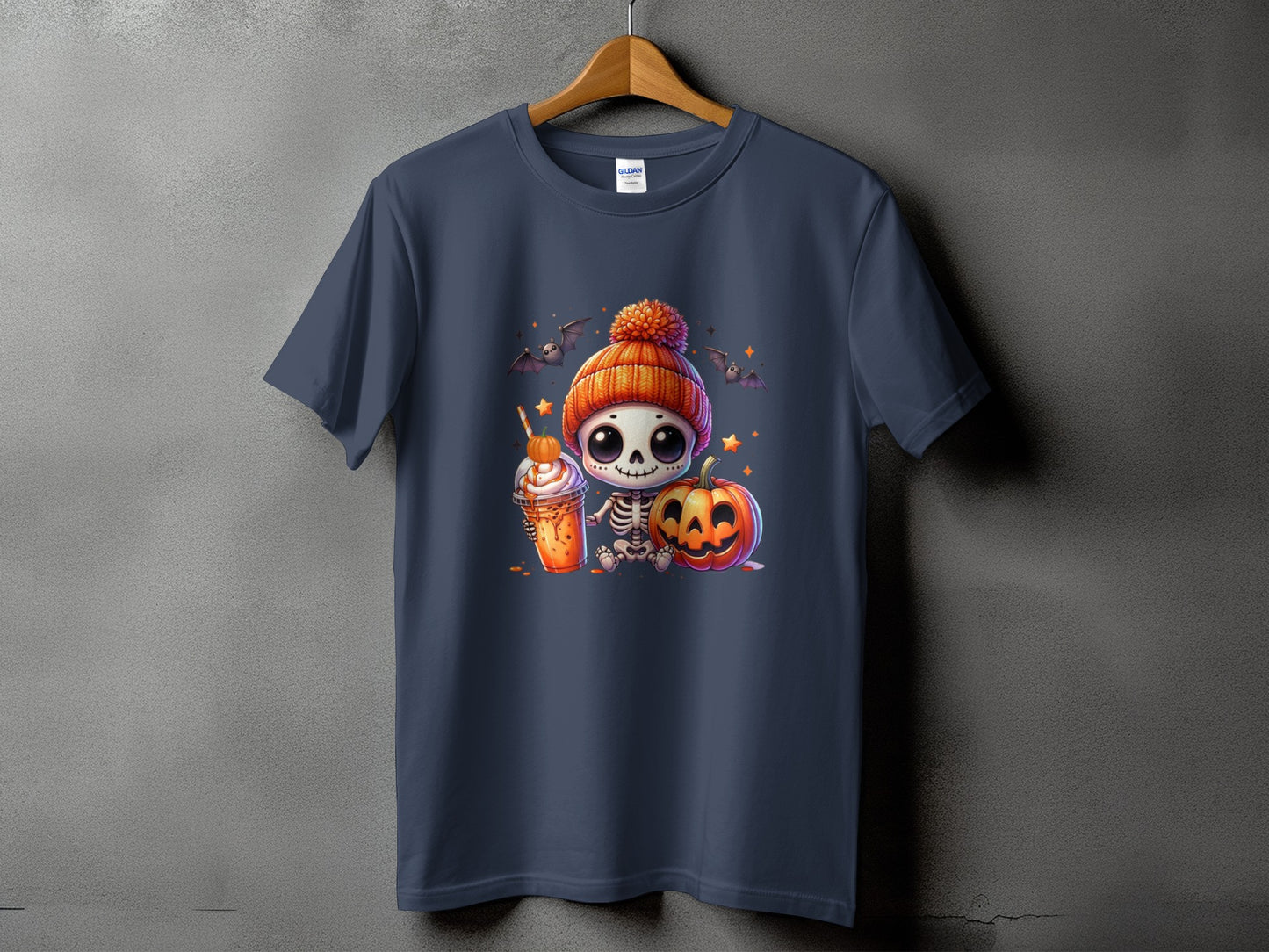 Skeleton in beanie with latte and pumpkin, surrounded by bats and stars.