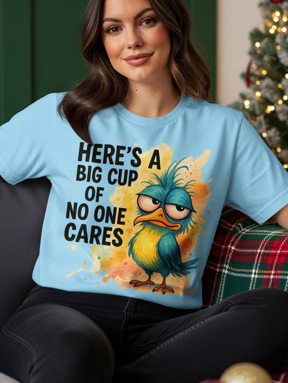 Light blue t-shirt with "HERE'S A BIG CUP OF NO ONE CARES" and cartoon bird graphic.