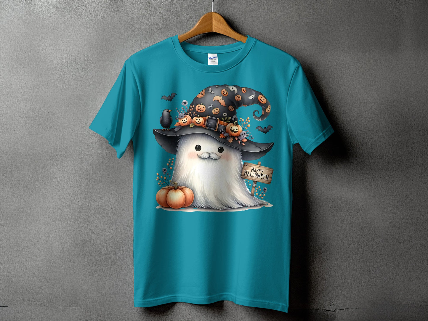 Teal t-shirt with a cute ghost character wearing a witch hat and holding a "Happy Halloween" sign.