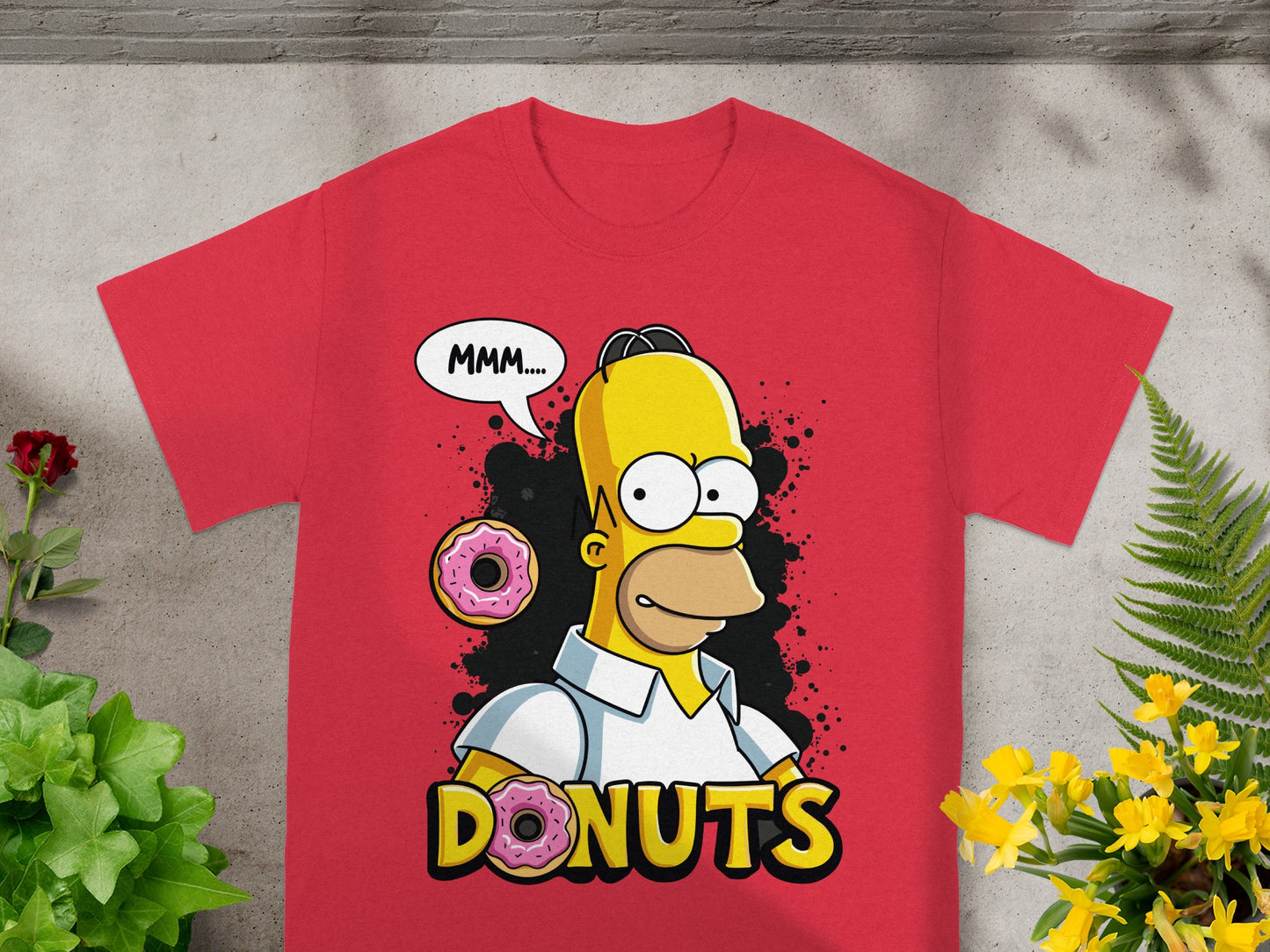Homer Simpson saying "MMM.... DONUTS" with donuts on a red t-shirt.