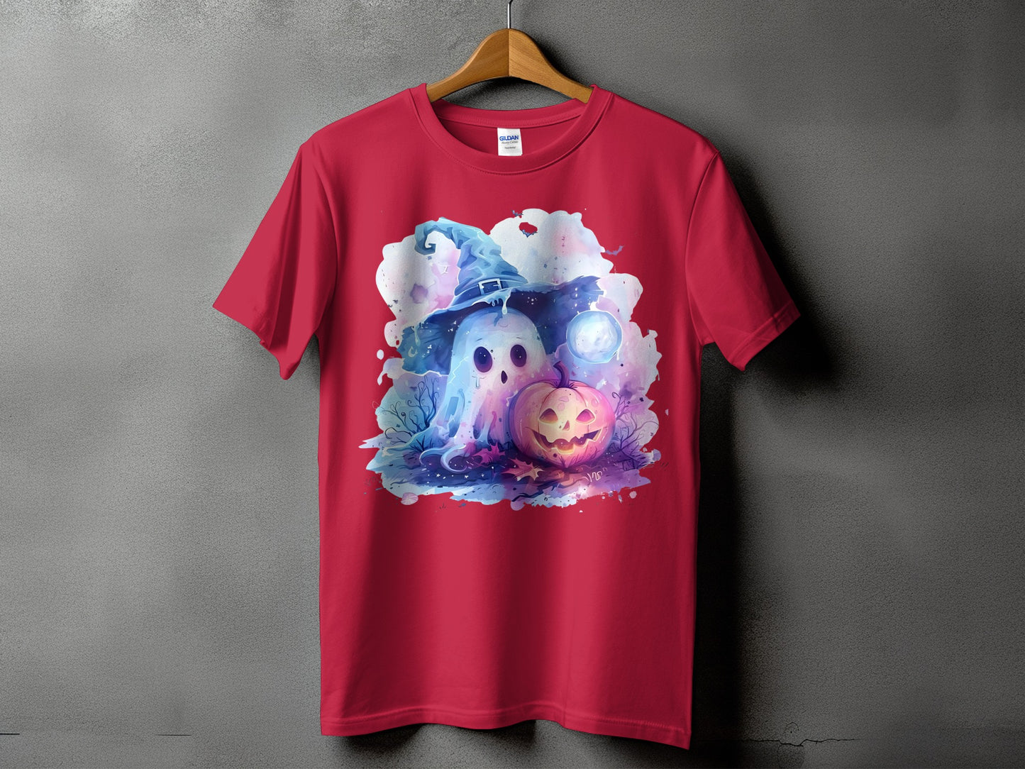 Red t-shirt with Halloween ghost, pumpkin, and witch hat graphic on front.