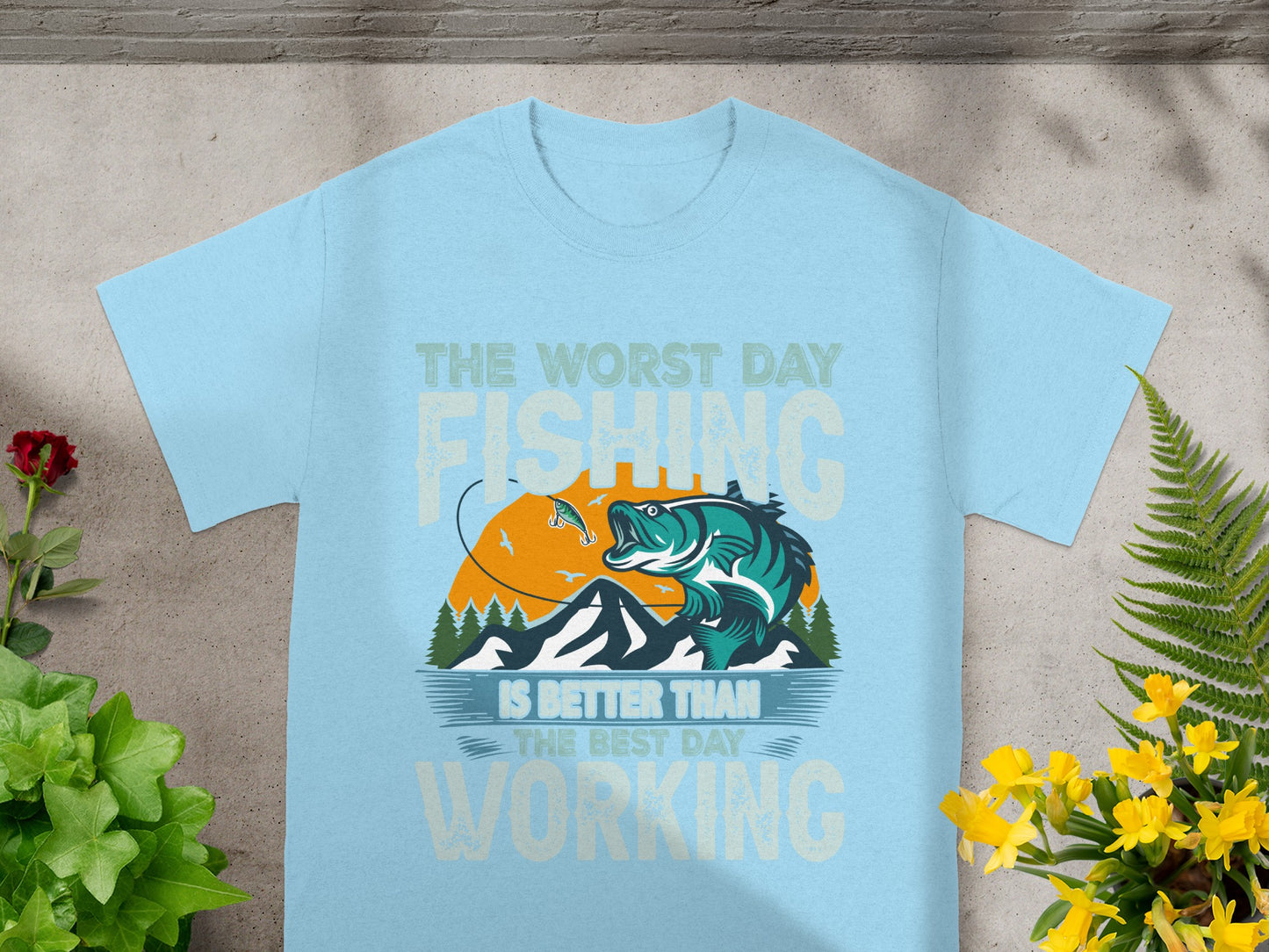 Light blue t-shirt with fishing graphic and text "The worst day fishing is better than the best day working."