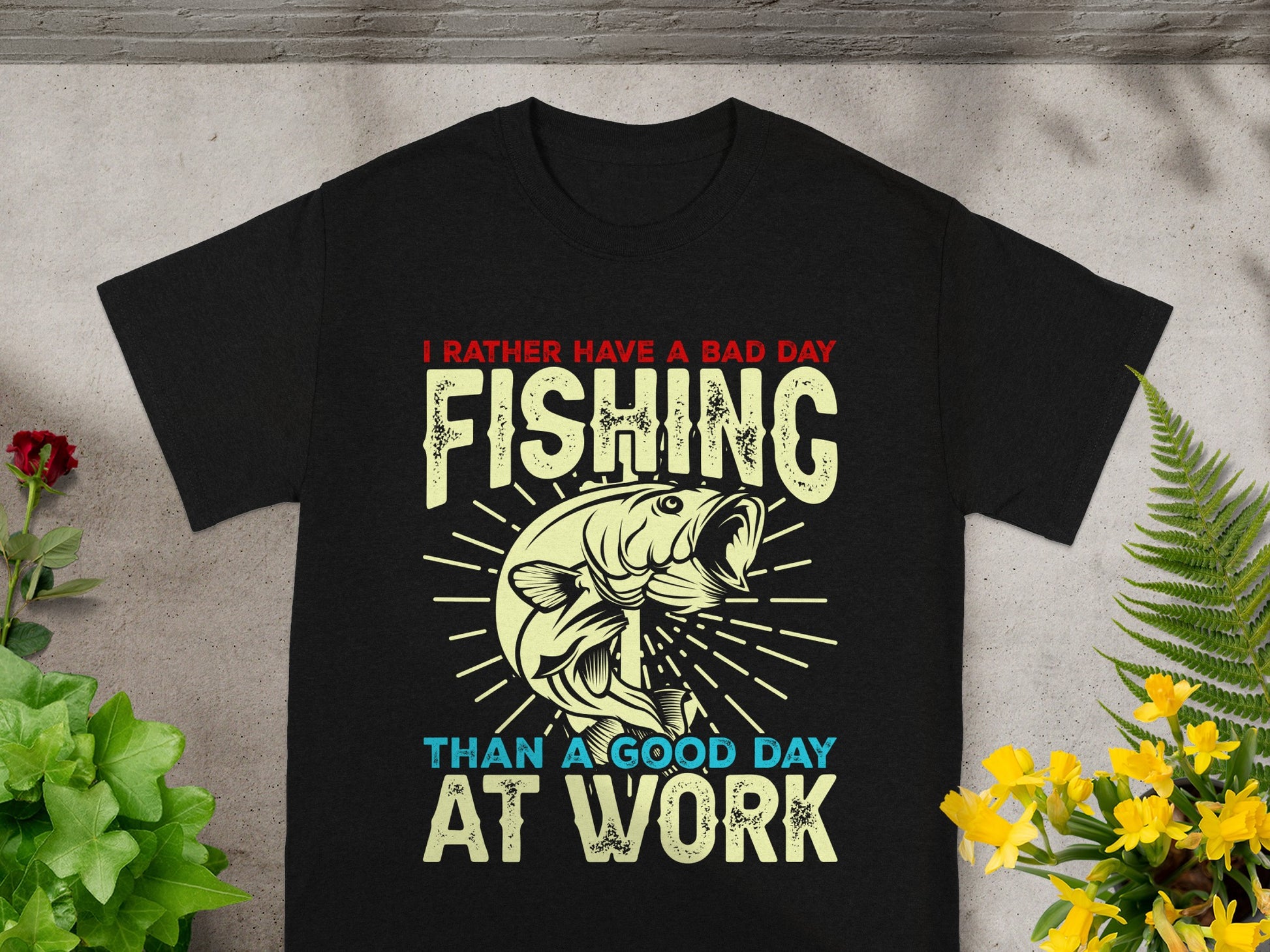 Black t-shirt with "I rather have a bad day fishing than a good day at work" text and graphic.