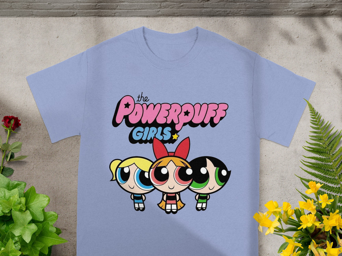 The Powerpuff Girls graphic t-shirt with characters Blossom, Bubbles, and Buttercup.