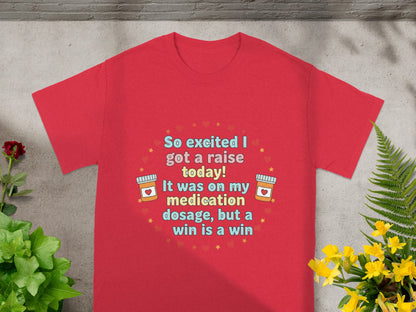 Red t-shirt with text "So excited I got a raise today! It was on my medication dosage, but a win is a win".