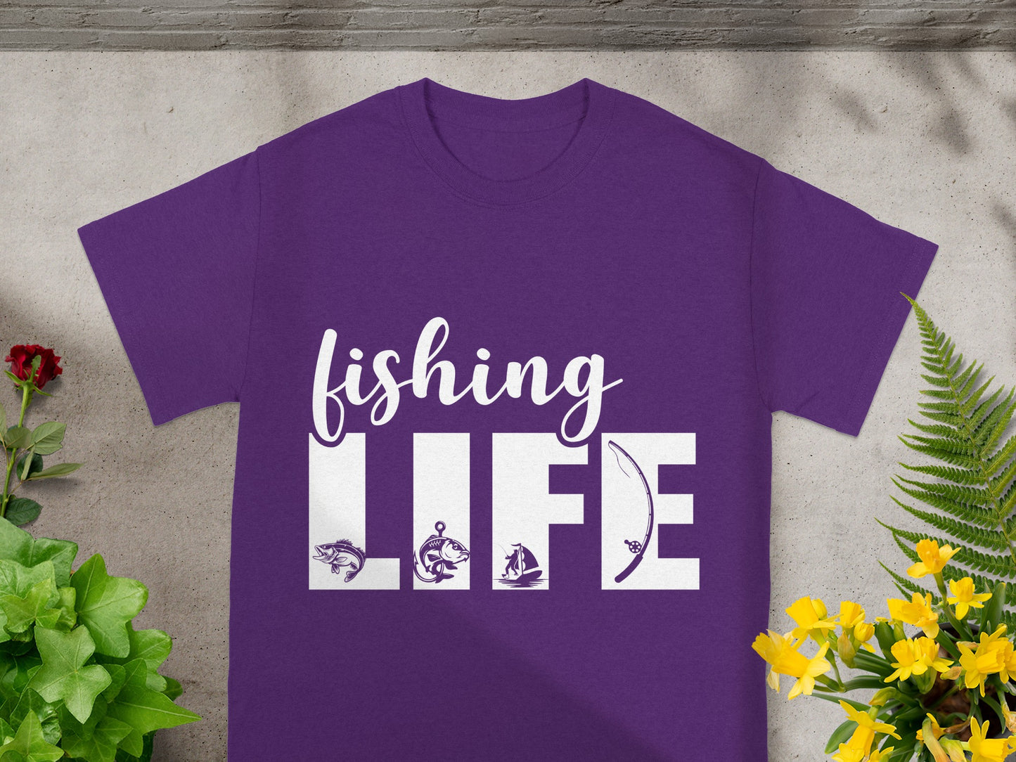 Purple t-shirt with white text "FISHING LIFE" and fishing-themed graphics.