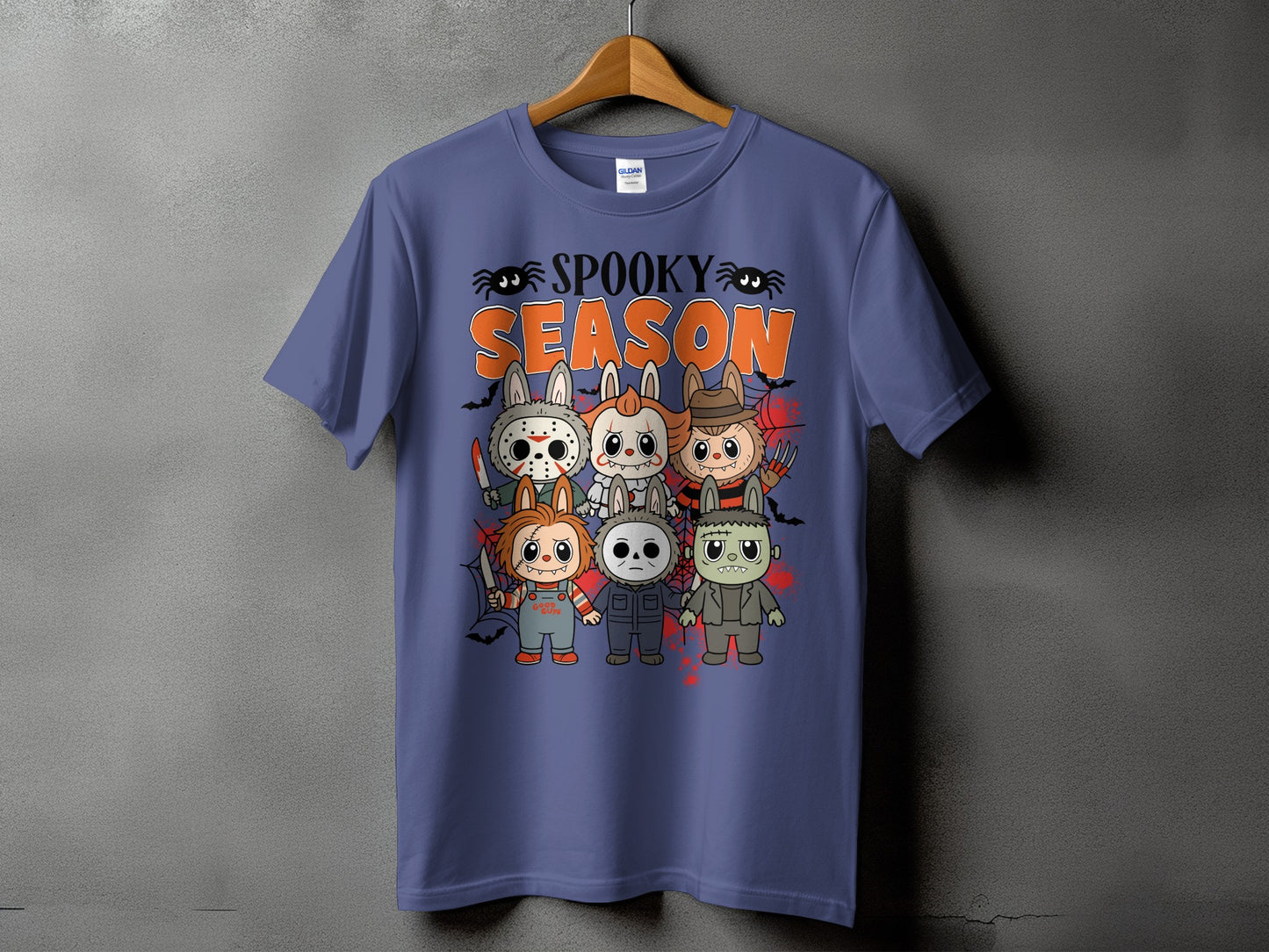 Purple t-shirt with "Spooky Season" text and cartoon horror characters.