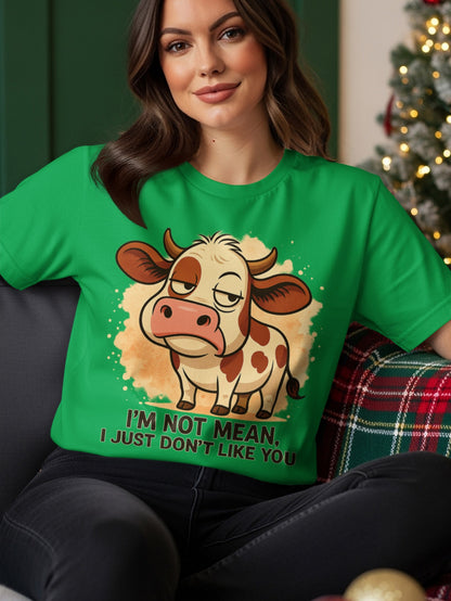 Green t-shirt with a cartoon cow and the text "I'm not mean, I just don't like you."