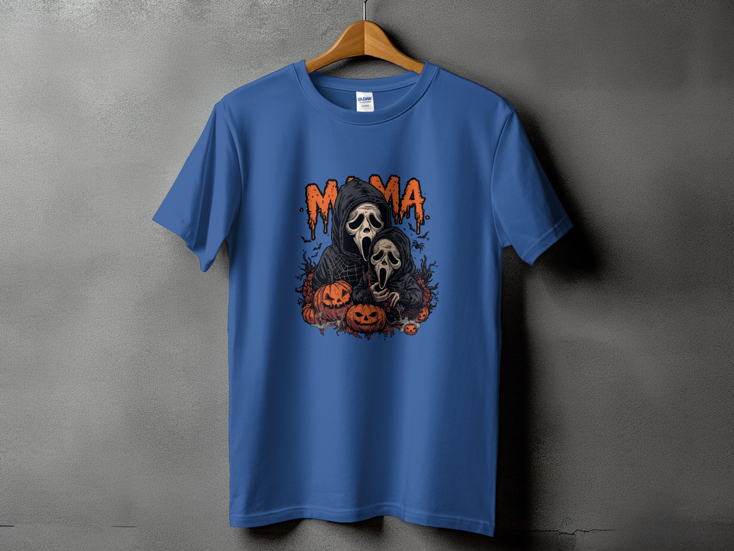 Blue t-shirt with Halloween design featuring "Mama" text and Scream mask figures with pumpkins.