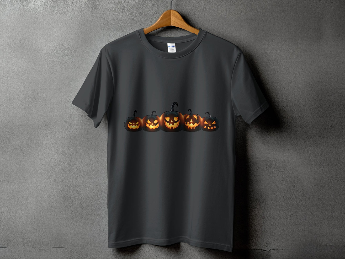 Dark gray t-shirt with a row of glowing Jack-o'-lanterns on the front.
