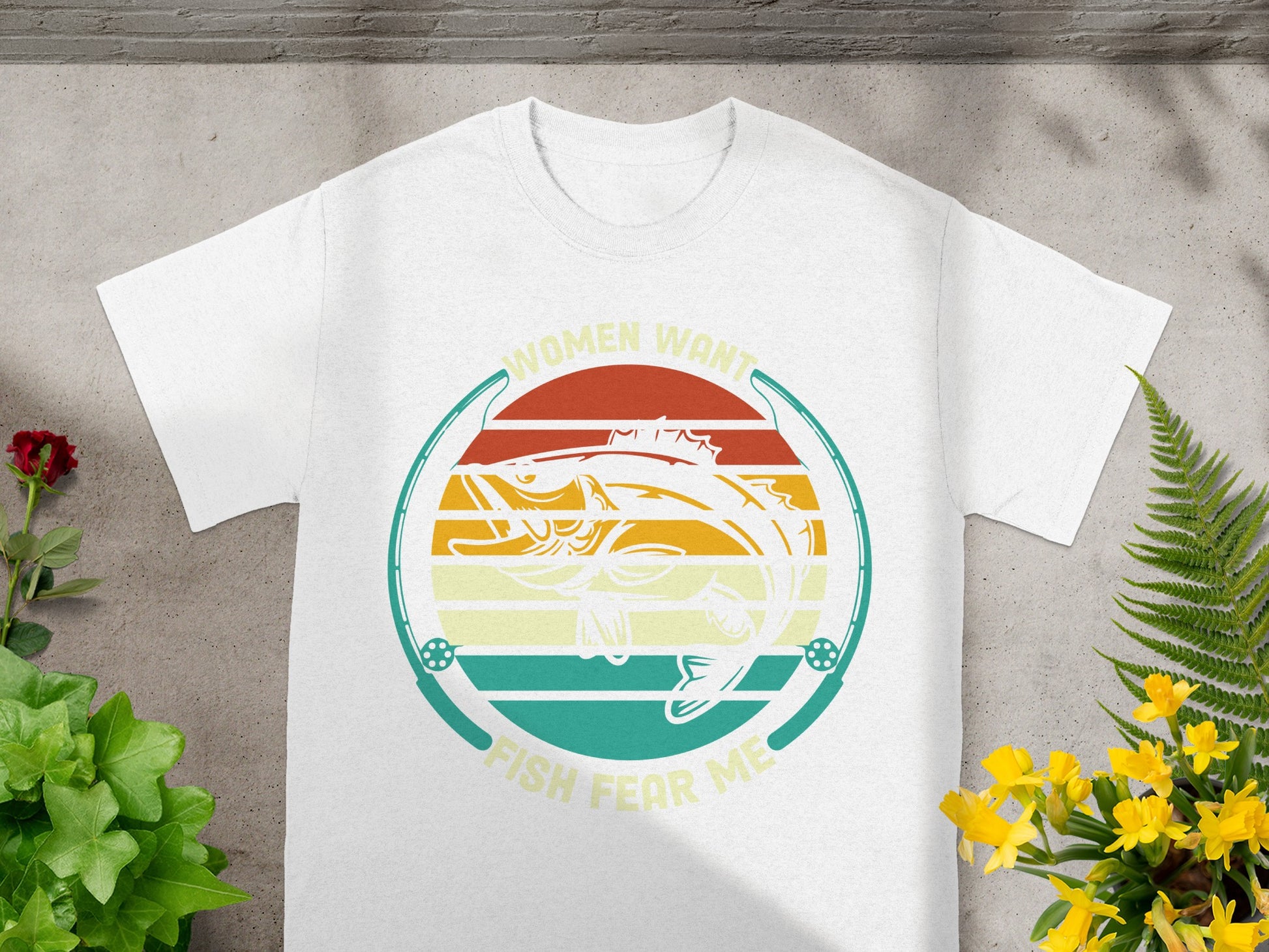 White t-shirt with graphic "Women want fish fear me" and a fish, fishing rods.