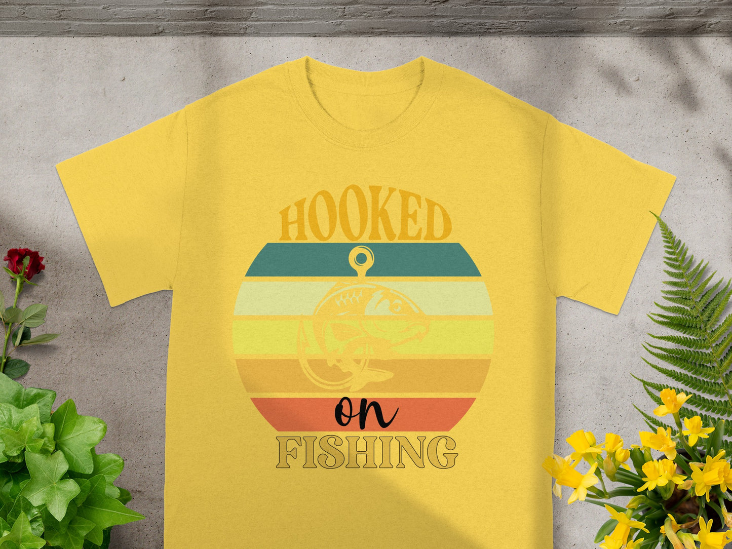 Yellow t-shirt with "HOOKED on FISHING" and a fish graphic.