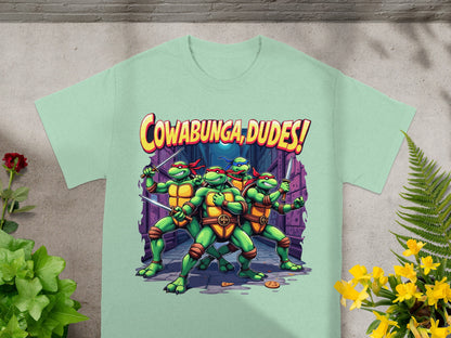 Teenage Mutant Ninja Turtles stand ready with katanas, text reads "Cowabunga, Dudes!"