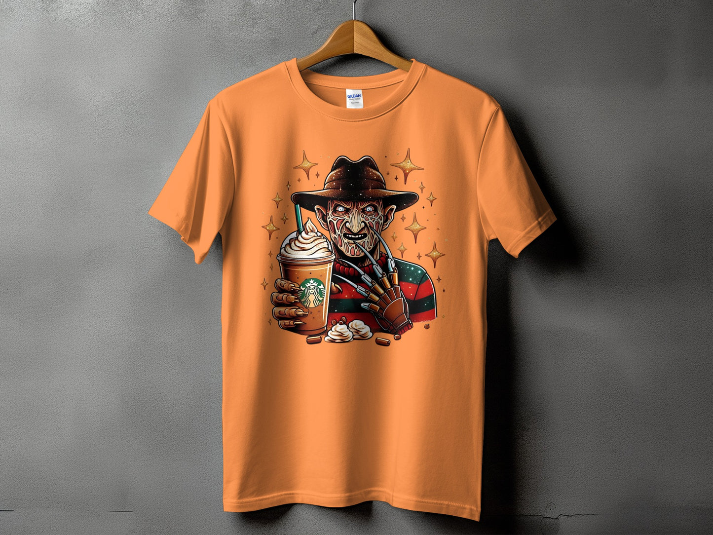 Orange t-shirt with Freddy Krueger holding a Starbucks-like coffee drink.
