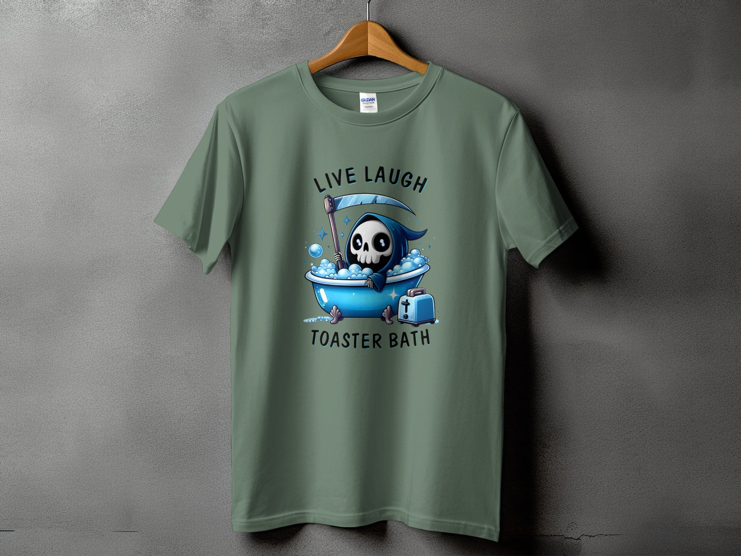 Green t-shirt with grim reaper in bathtub and text "Live Laugh Toaster Bath".