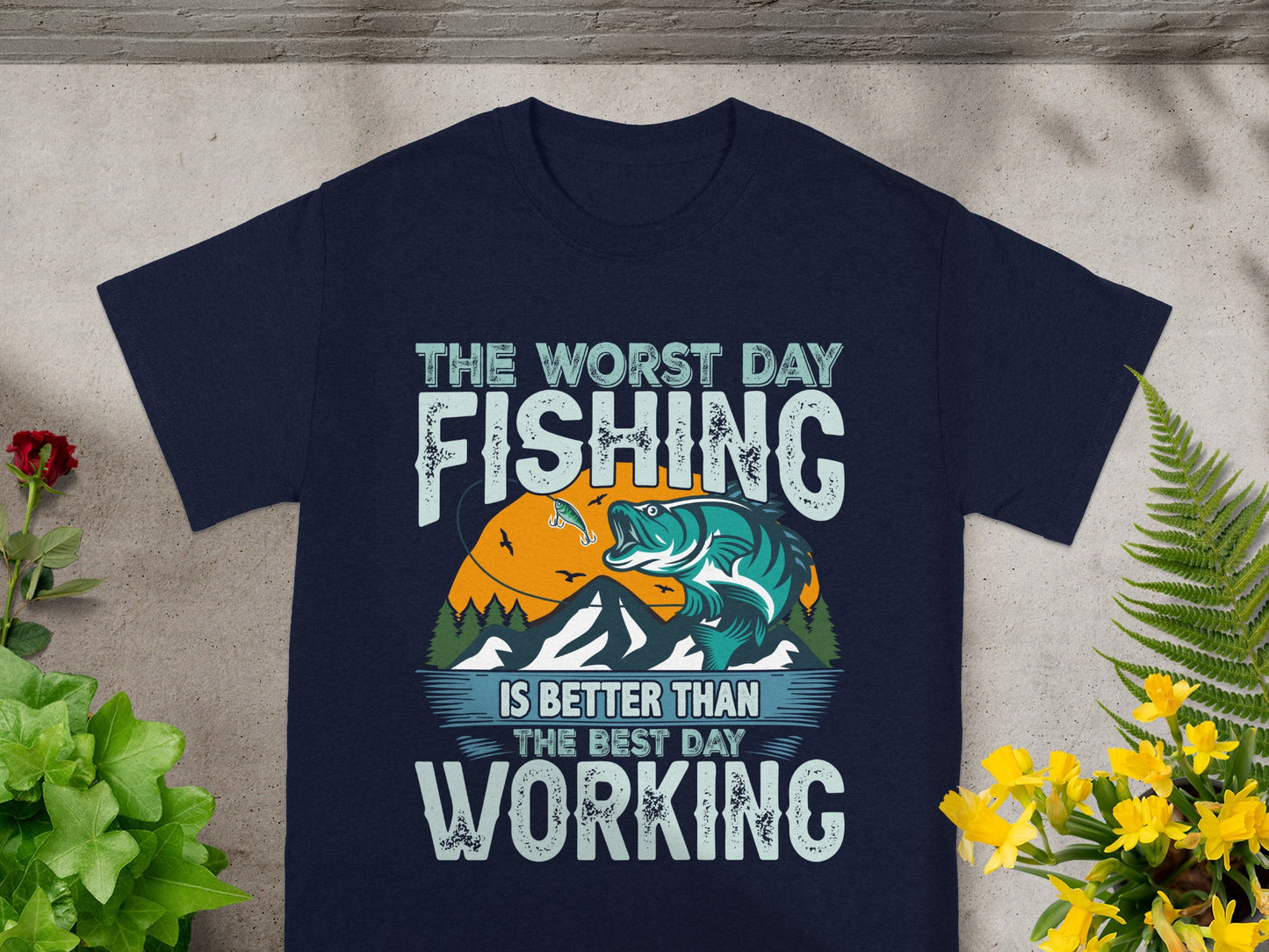 Navy t-shirt with "The Worst Day Fishing Is Better Than The Best Day Working" text and graphic.