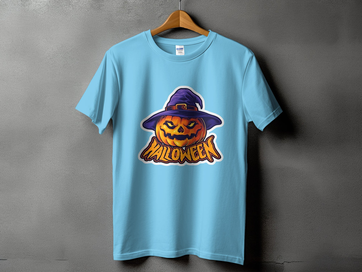 Light blue t-shirt with a jack-o'-lantern wearing a witch hat and "Halloween" text graphic.