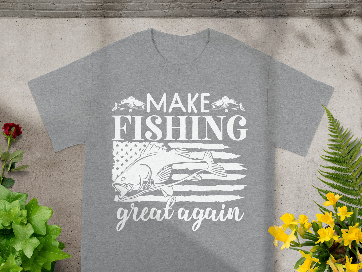 Grey t-shirt with "Make Fishing Great Again" text, fish, and flag graphic.